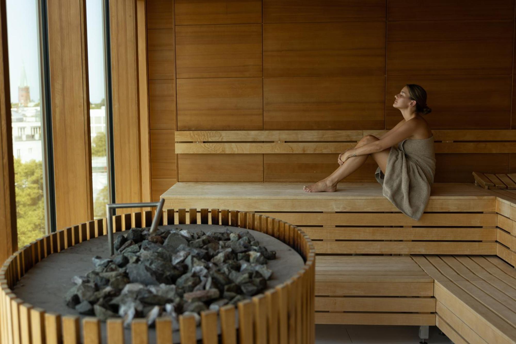 The Fontenay Hamburg Exterior photo A woman in a Finnish sauna